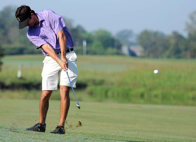 LSU sophomore golfer Curtis Thompson chips the ball onto the green Saturday morning at the fourth-annual David Toms Intercollegiate held at The University Club.
 