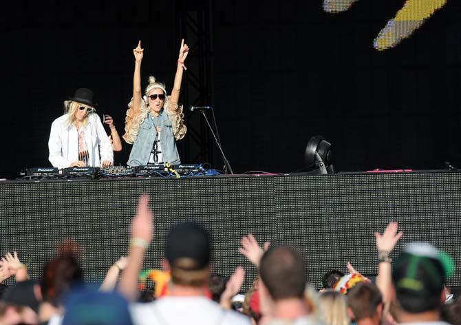 Twins Mim and Liv Nervo of NERVO pump up the crowd at Voodoo Fest in New Orleans on October 26, 2012.
 