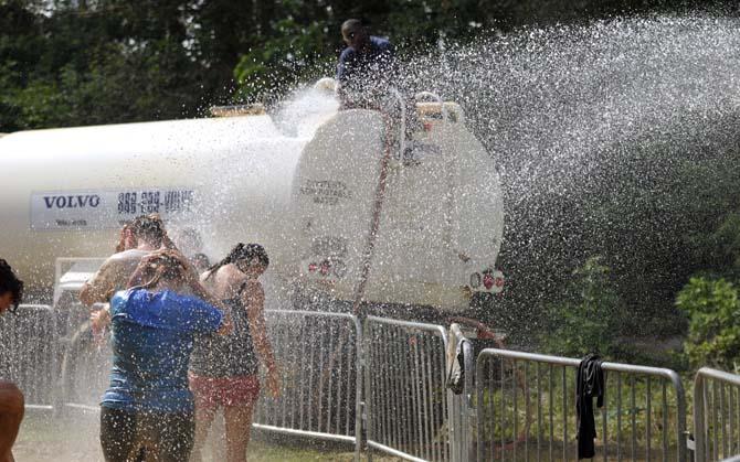 Runners face fire, mud and walls in 5k Warrior Dash