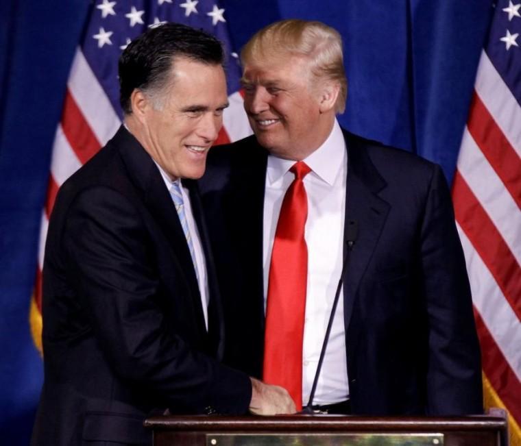 Republican presidential candidate Mitt Romney greets entrepreneur and TV personality Donald Trump on Feb. 2, 2012, during a news conference in Las Vegas, NV.
 