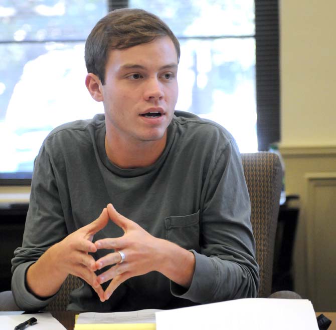 Student Body President Taylor Cox speaks to board members at a Student Technology Fee Oversight Committee meeting Monday afternoon.
 