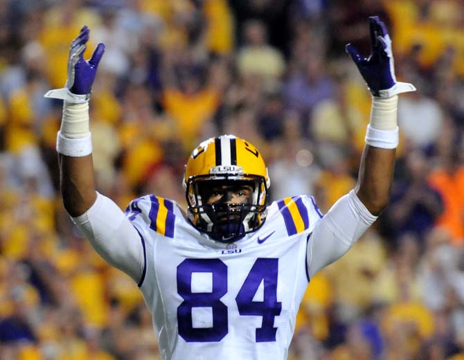 LSU sophomore tight end Nic Jacobs (84) excites the crowd Saturday, Oct. 13, 2012 during the Tigers' 23-21 win against South Carolina in Tiger Stadium.
 