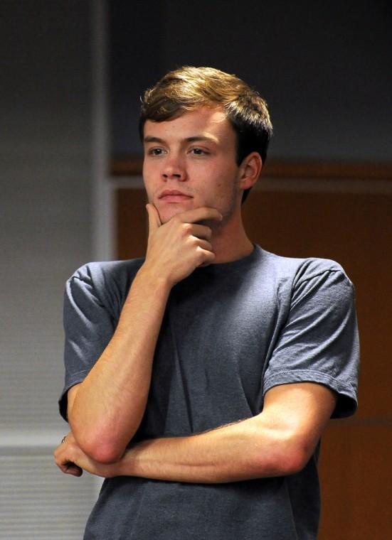 Student Government President Taylor Cox listens on Wednesday, Oct. 31, 2012 in the Capital Chambers of the Student Union to the discussion regarding a greek caucus.
 