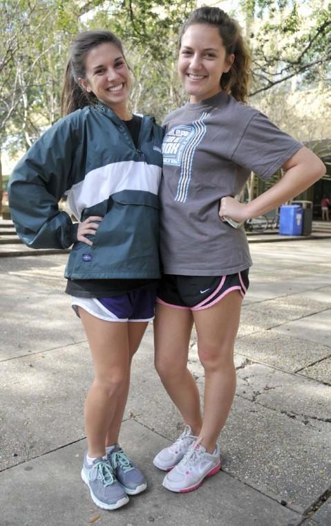 Elementary education freshman Meghan Bellingham (left) and humanities freshman Emily Taylor (right) show off their "Frat Style" together Monday afternoon in the quad near Middleton Library.
 