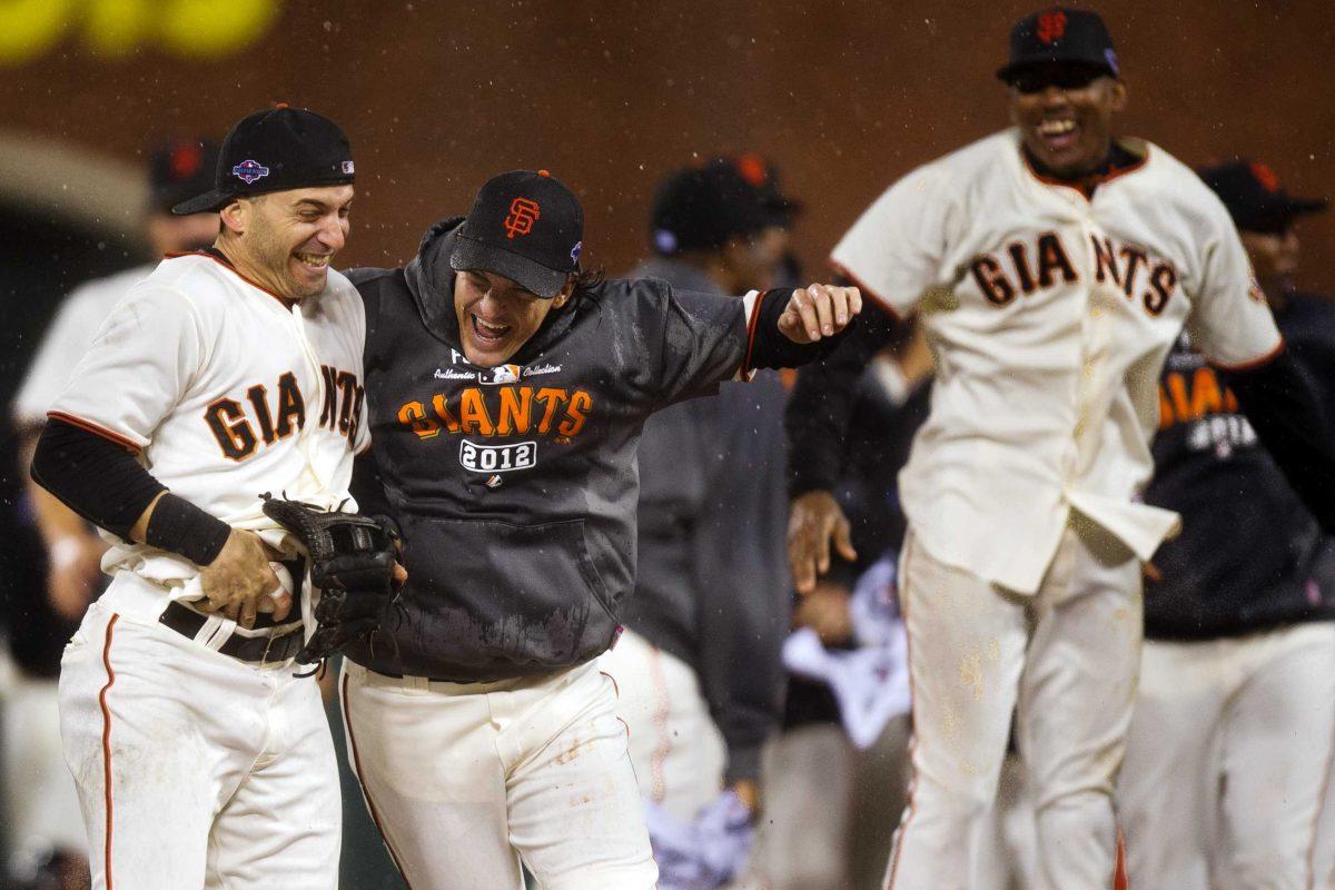 <p>San Francisco Giants' Marco Scutaro celebrates with Ryan Theriot following the last out of Game 7 of baseball's National League championship series against the St. Louis Cardinals, Monday, Oct. 22, 2012, in San Francisco. The Giants won 9-0. (AP Photo/The Sacramento Bee, Jose Luis Villegas) MAGS OUT; LOCAL TV OUT (KCRA3, KXTV10, KOVR13, KUVS19, KMAZ31, KTXL40); MANDATORY CREDIT</p>