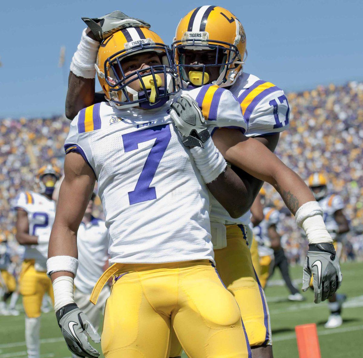 <p>LSU sophomore cornerback Tyrann Mathieu, 7, celebrates after his touchdown from a recovered fumble Saturday afternoon October 11, 2011 in Tiger Stadium.</p>