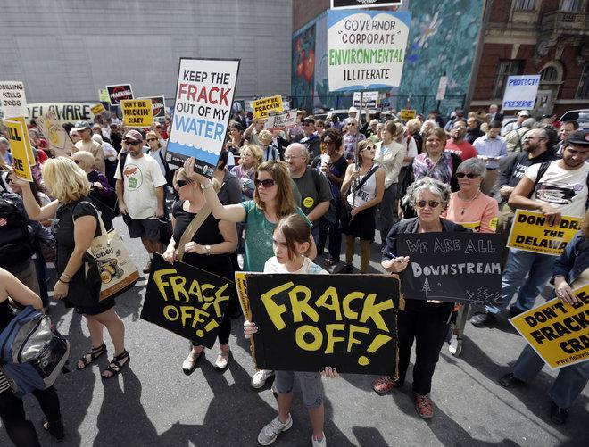 Protestors opposed to hydraulic fracturing, demonstrate outside a Marcellus
Shale industry conference on Sept. 20 in Philadelphia.
 