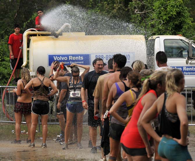 Runners face fire, mud and walls in 5k Warrior Dash