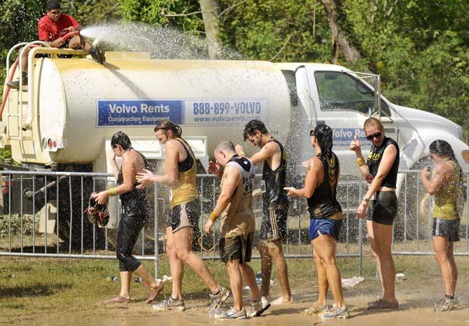 Runners face fire, mud and walls in 5k Warrior Dash