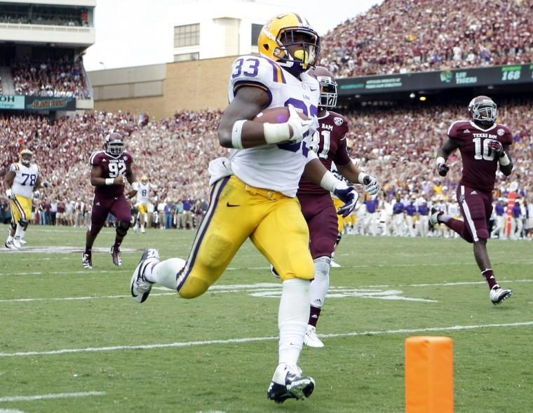 LSU running back Jeremy Hill (33) breaks away for a touchdown to extend the LSU lead against Texas A&amp;M during an NCAA college football game, Saturday, Oct. 20, 2012, in College Station, Texas. LSU won the game 24-19. (AP Photo/Houston Chronicle, Nick de la Torre) MANDATORY CREDIT
 