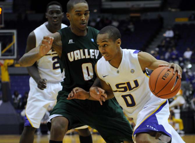 Charles Carmouche (0), LSU senior guard, runs with the ball Saturday, Nov. 24, during the LSU vs. Mississippi Valley State game.
 