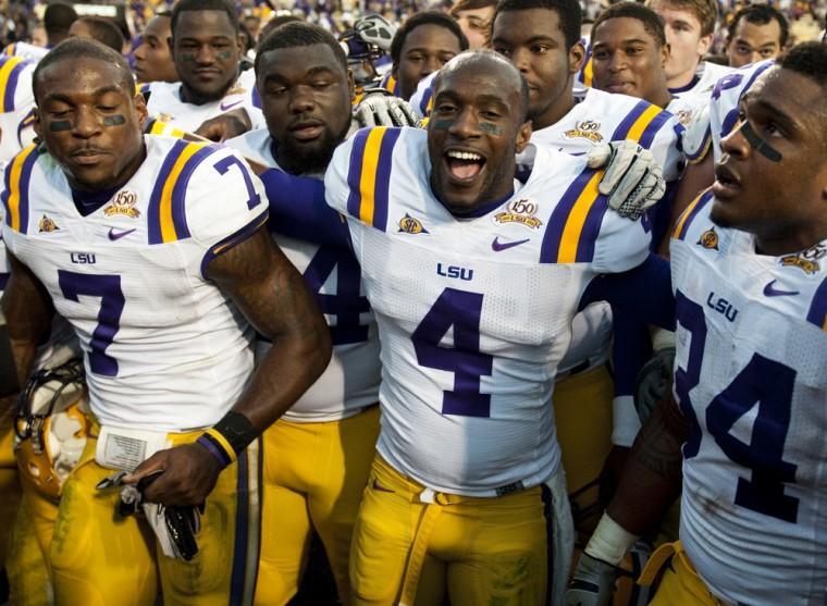 Former LSU cornerbacks Patrick Peterson (7) and Jai Eugene (4) celebrate Saturday, Nov. 11, 2010 after the Tigers beat Alabama 24-21 in Tiger Stadium.
 