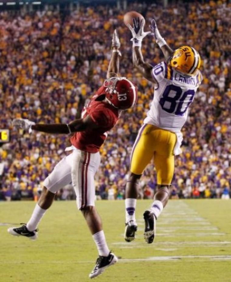 LSU wide receiver Jarvis Landry (80) catches a touchdown pass over Alabama defensive back Deion Belue (13) during the fourth quarter of an NCAA college football game in in Baton Rouge, La., Saturday, Nov. 3, 2012. Photo: Bill Haber / AP
 