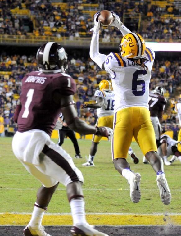 LSU junior safety Craig Loston (6) intercepts a pass from MSU junior quarterback Tyler Russell during the Tigers' 37-17 victory over the Bulldogs Saturday November 10, 2012 in Tiger Stadium.
 