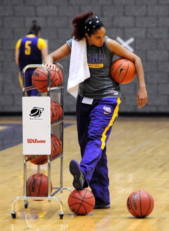 Teejay Jones, sports administration sophomore and Lady Tiger Basketball team manager, works during a practice on November 14, 2012.
 