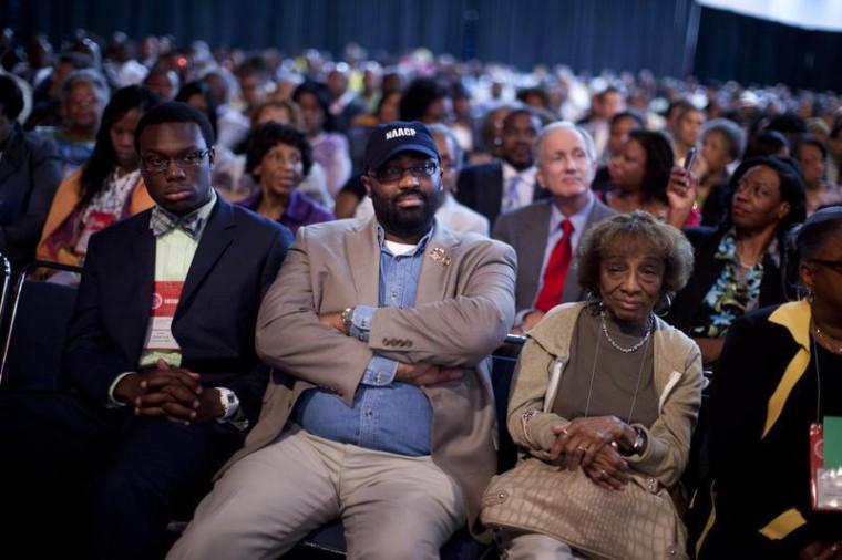 Participants listen to Republican presidential candidate, former Massachusetts Gov. Mitt Romney, deliver a speech during the NAACP annual convention on Wednesday in Houston.
 