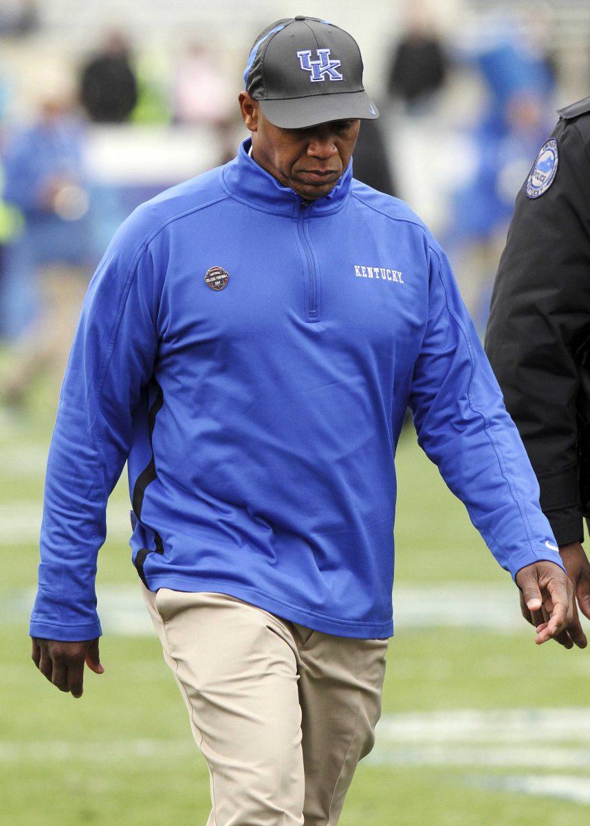 Kentucky head coach Joker Phillips walks off the field after his team's 40-0 loss to Vanderbilt in an NCAA college football game at Commonwealth Stadium in Lexington, Ky., Saturday, Nov. 3, 2012. (AP Photo/ James Crisp)