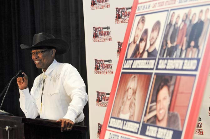 Baton Rouge Mayor-President Kip Holden dons a cowboy hat to celebrate the announcement of the 2013 Bayou Country Superfest lineup Tuesday, Nov. 27, 2012.&#160;
 