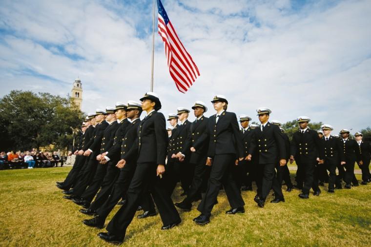 Members of the LSU ROTC march past the flag pole during the LSU Salutes ceremony in the Fall of 2009.
 