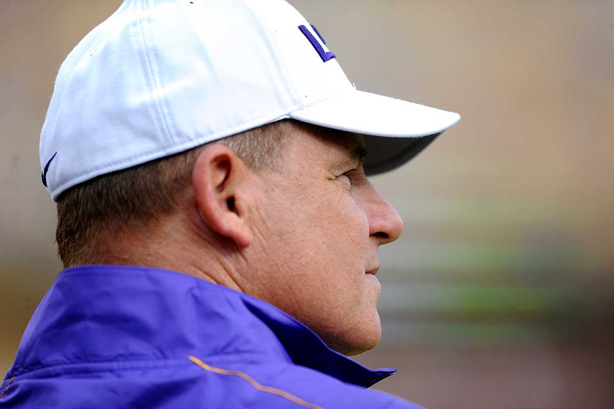 LSU football coach Les Miles watches his team during pregame warmups before the Tigers' 41-14 victory against North Texas Sept. 1, 2012, in Tiger Stadium.