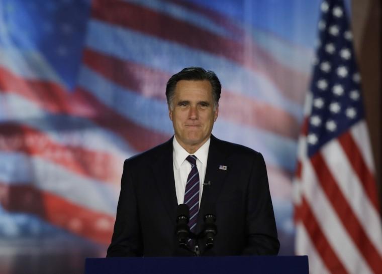 Republican presidential candidate and former Massachusetts Gov. Mitt Romney arrives to his election night rally, Wednesday, Nov. 7, 2012, in Boston. President Obama defeated Republican challenger former Massachusetts Gov. Mitt Romney. (AP Photo/Elise Amendola)
 