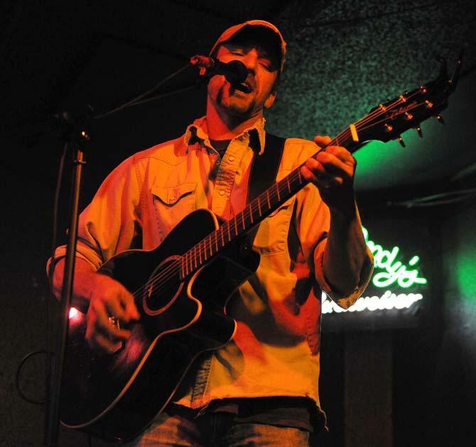 Joshua Cartmill, associate clinic specialist at the LSU Veterinary Teaching Hostpital, plays November 14 at Phil Brady's Bar and Grill on Government Street. He is one of many University faculty members who are musicians on the side.
 