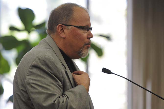 Mike Woods, Chairman of the LSU Alumni Association, approaches the LSU Board of Supervisors about the newly proposed guiding principles on Friday, Nov. 2, 2012 at the LSU System Building.
 