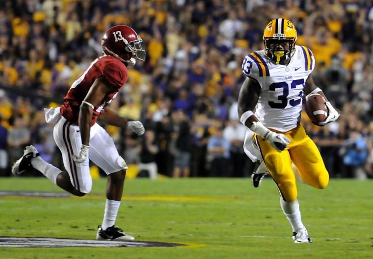 LSU freshman running back Jeremy Hill (33) runs the ball Saturday, Nov. 3, 2012 during the Tigers' 21-17 loss against Alabama in Tiger Stadium.
 