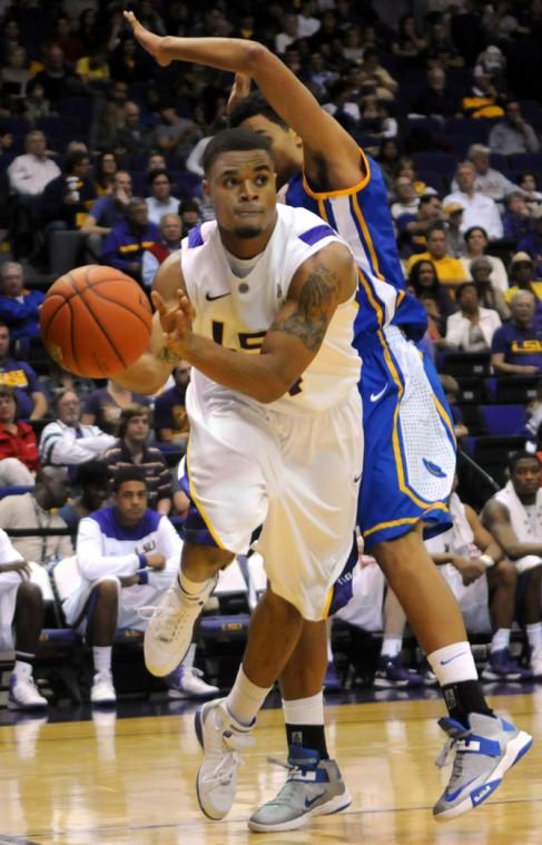 LSU freshman guard Corban Collins (4) drives past a UCSB defender on Friday, Nov. 9, 2012 in the 77-63 win over the University of California, Santa Barbara in the PMAC.
 