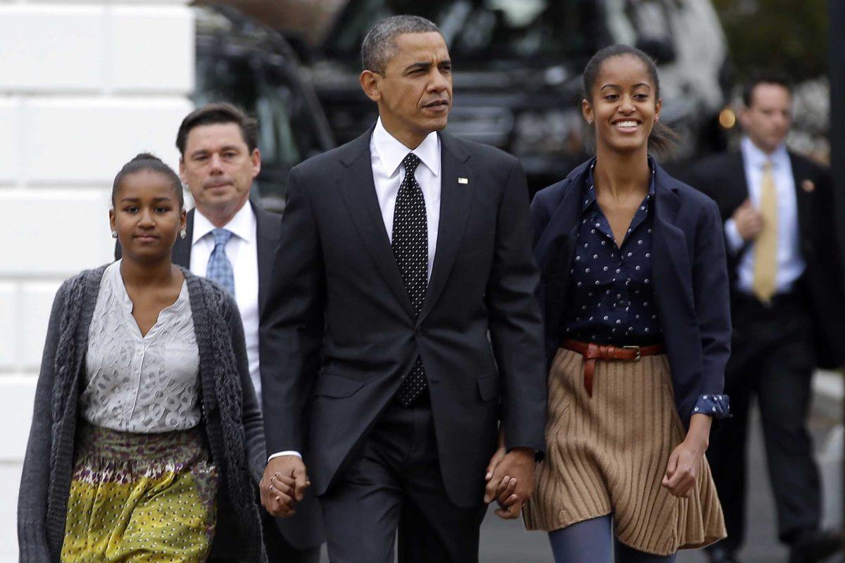 FILE - This Oct. 28, 2012 file photo shows President Barack Obama walking to St. John's Episcopal Church in Washington from the White House with his daughters Sasha, left, and Malia. Campaign 2012 is rich with images that conjure the seriousness and silliness that unfold side-by-side in any presidential race. Aww, who didn't smile and do a double-take when Malia and Sasha Obama walked on stage at the Democratic convention to join their mom and dad after the president's speech. The girls looked so much more poised and mature than when they stood on the convention stage four years earlier. (AP Photo/Jacquelyn Martin, File)