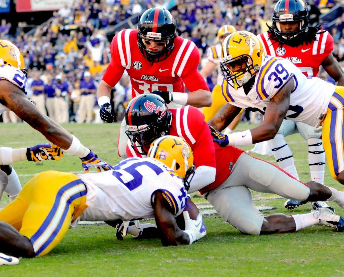 LSU freshman linebacker Deion Jones (45) recovers an Ole Miss fumble during the Tigers' 41-35 victory over the Rebels Saturday Nov. 17, 2012 in Tiger Stadium.