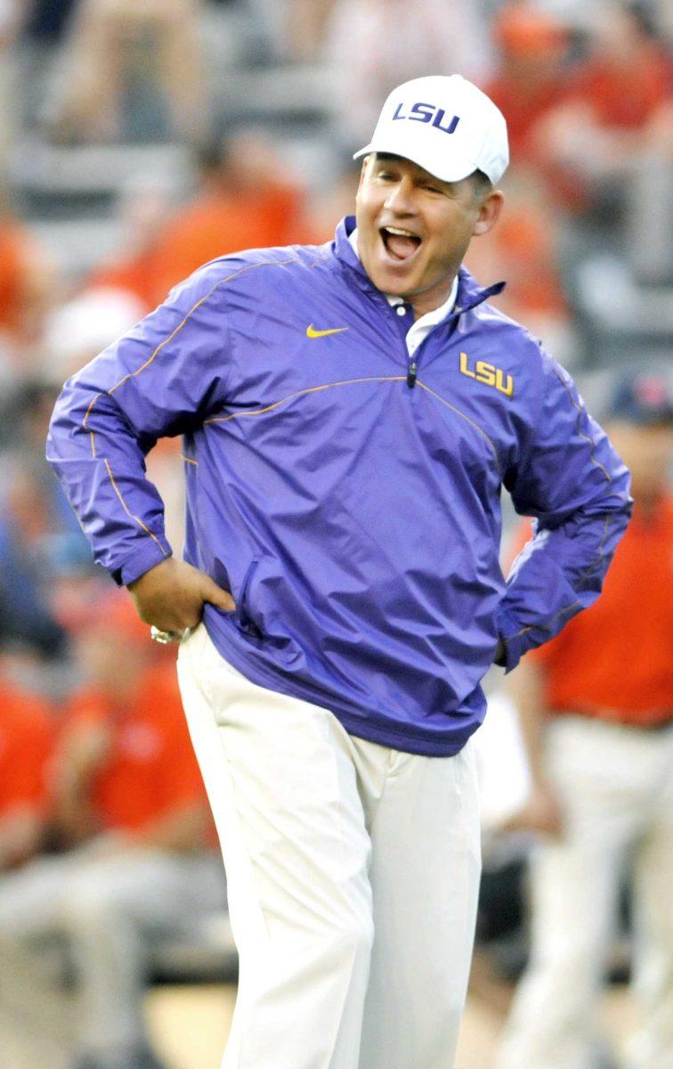 LSU head coach Les Miles clowns around before the Tigers' 12-10 victory over Auburn on Saturday Sept. 22, 2012 in Jordan-Hare Stadium.