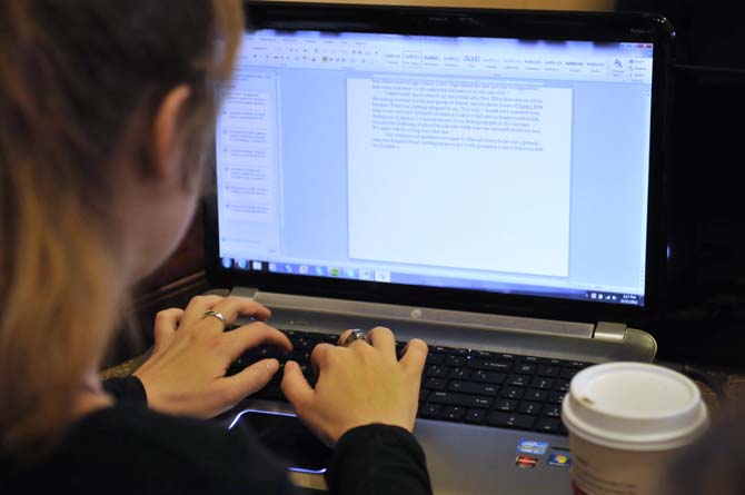 Alex Bessell, anthropology freshman, works on her novel Sunday at CC's Coffee House.
 