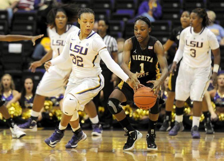 LSU freshman guard Danielle Ballard (32) tries to steal the ball away from Wichita State senior guard Jasmine Jones (1) during the Tiger's 72-70 win over the Shockers on November 11, 2012.
 