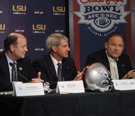 LSU Head Coach Les Miles discusses the upcoming Chick-fil-A Bowl during a press conference Tuesday, Dec. 12, with&#160; Gary Stoken, Chick-fil-A Bowl president and Joe Alleva, LSU vice chancellor and director of athletics.
 