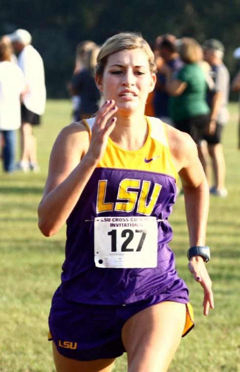 Freshman cross country runner Morgan Schuetz (127) crosses the finish line during the women's 6K Saturday, September 22, 2012 during the LSU Invitational at Highland Road Park.