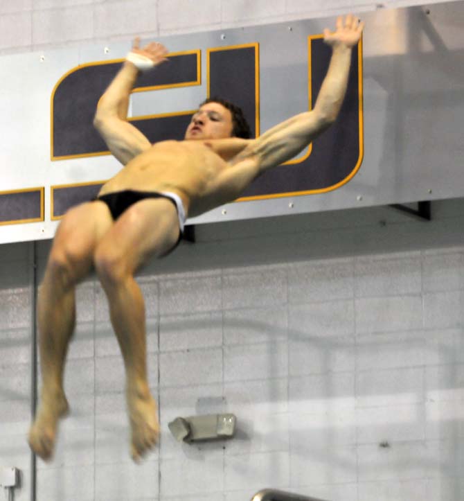 <p>LSU diving junior Jesse Lyman flips through the air during a meet against Alabama on November 2, 2012.</p>