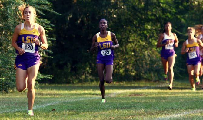 Senior cross country runner Laura Carleton (120) leads in the women's 6K Saturday, September 22, 2012 during the LSU Invitational at Highland Road Park.