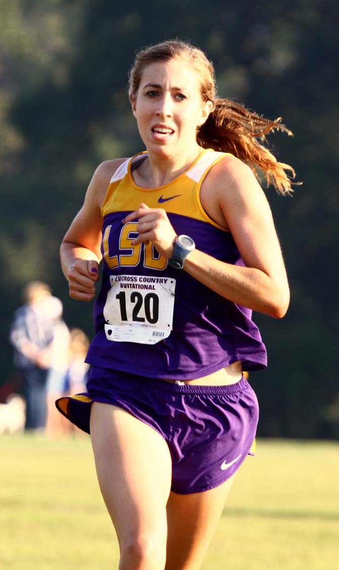 Senior cross country runner Laura Carleton (120) finishes first in the women's 6K Saturday, September 22, 2012 during the LSU Invitational at Highland Road Park.