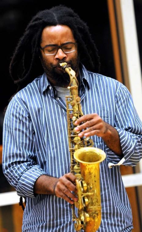 Graduate student Reagan Mitchell performs a saxophone solo during the African American Cultural Center's Annual Pre-Kwanzaa Celebration on Tuesday night in the Atchafalaya Room in the Student Union.