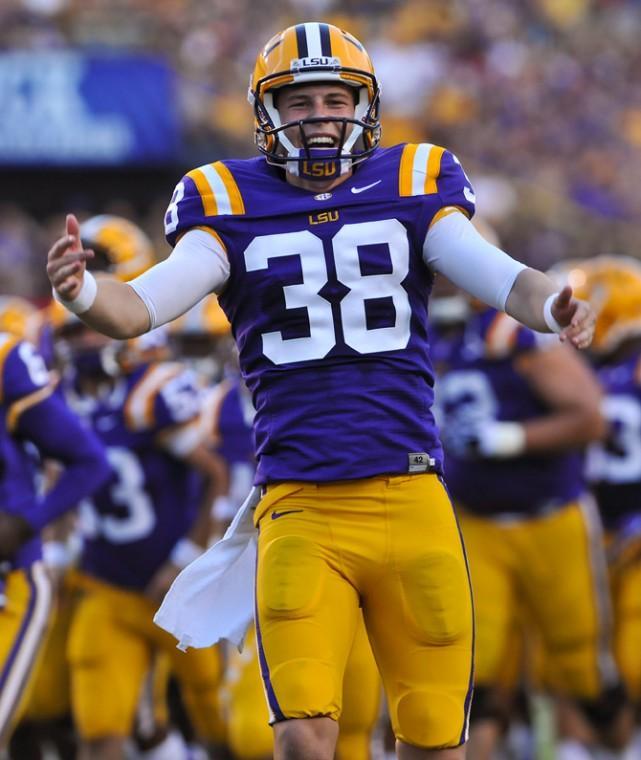 LSU sophomore punter Brad Wing (38) pumps up the student section as the team heads to the locker room before the Tigers' 63-14 victory against Idaho on Sept. 15, 2012, in Tiger Stadium.