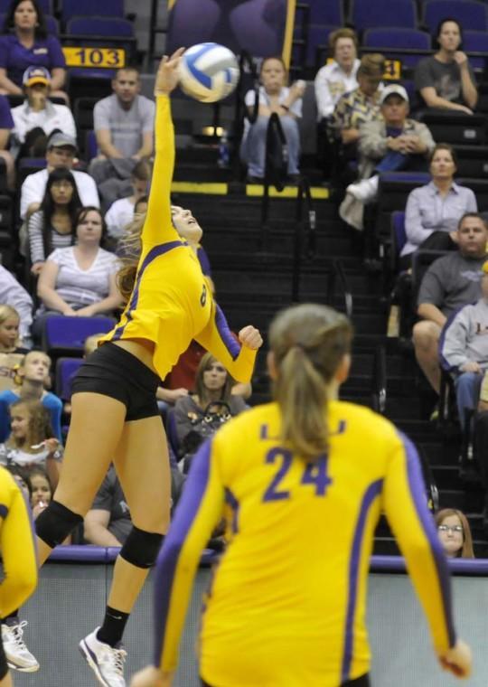 Sophomore outside hitter Helen Boyle (8) spikes the ball Sunday, November 4, 2012 during the Tigers' 3-2 victory versus Ole Miss.