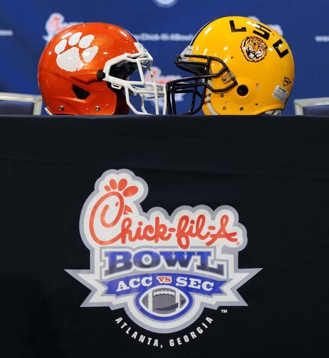 LSU and Clemson football helmets face each other Dec. 30 before a Chick-fil-A Bowl news conference in Atlanta, Ga.
 