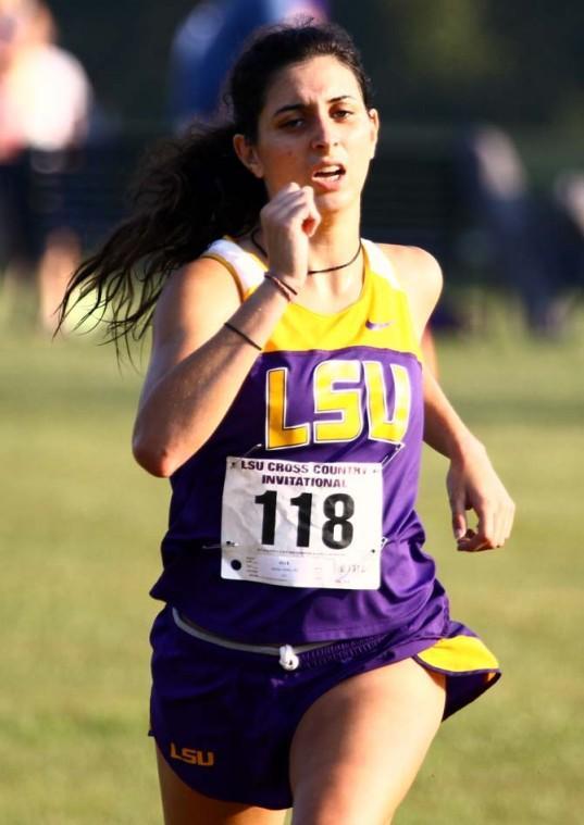 Sophomore cross country runner Andria Aguilar (118) finishes tenth in the women's 6K Saturday, September 22, 2012 during the LSU Invitational at Highland Road Park.