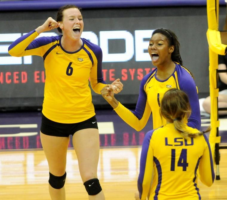 LSU senior outside hitter Madie Jones (6) and freshman middle blocker Khourtni Fears (1) celebrate a point Wednesday, Oct. 3, 2012 during the Tigers' match against Georgia in the PMAC.