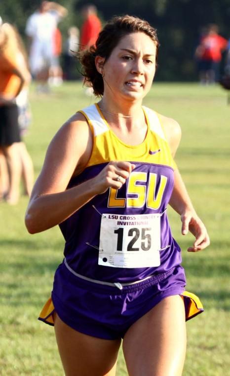 Sophomore cross country runner Michelle Mobley (125) crosses the finish line during the women's 6K Saturday, September 22, 2012 during the LSU Invitational at Highland Road Park.