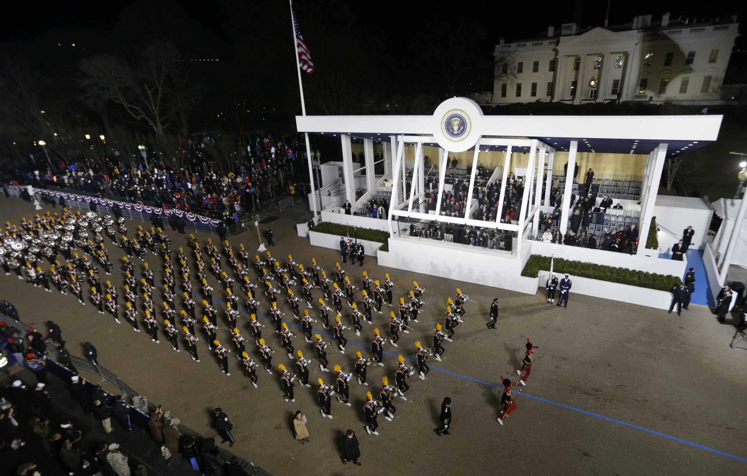 Time to act, Obama declares, taking oath 2nd time