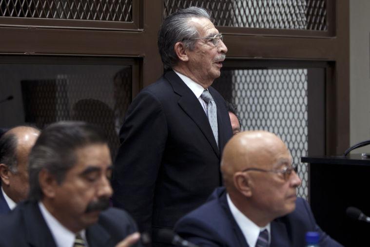 Guatemala's former dictator Jose Efrain Rios Montt, top, attends his hearing in Guatemala City, Monday, Jan. 28, 2013. Rios Montt, a former U.S.-backed dictator who presided over one of the bloodiest periods of Guatemala's civil war, will stand trial on charges he ordered the murder, torture and displacement of thousands of Mayan Indians, a judge ruled Monday. (AP Photo/Moises Castillo)
 