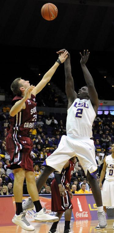 LSU sophomore forward Johnny O'Bryant III (2) shoots over Wednesday, Jan. 16, 2013 University of South Carolina's freshman forward Mindaugas Kacinas (25) during the Tigers' 73-82 loss to the Gamecocks in the PMAC.
 