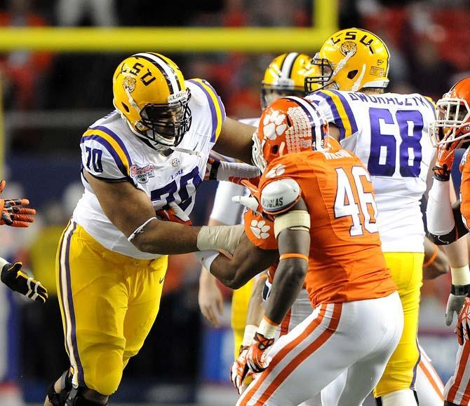 LSU sophomore offensive guard La'El Collins commits an offensive foul Monday, Dec. 31, 2012 during the Tigers' 24-25 loss in the Chick-fil-A Bowl against Clemson in Atlanta, Ga.